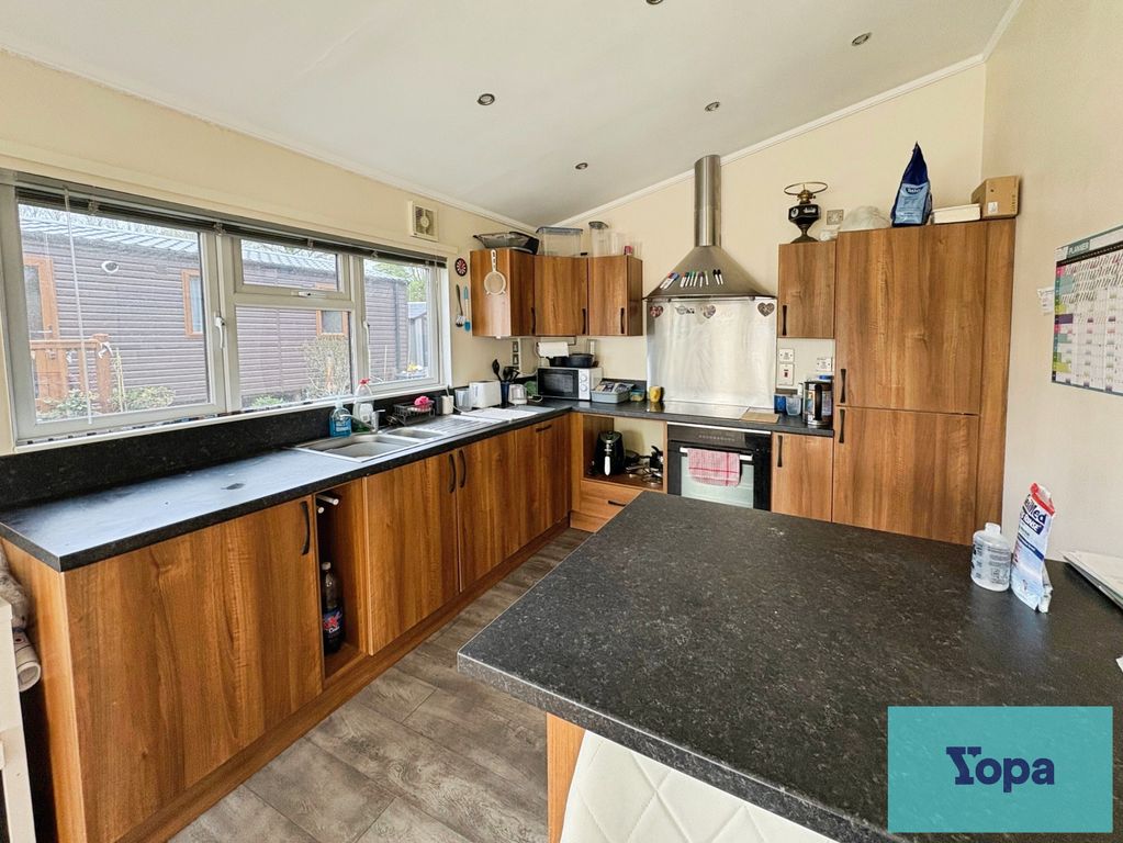 Property photo 3 of 19 Kitchen Area