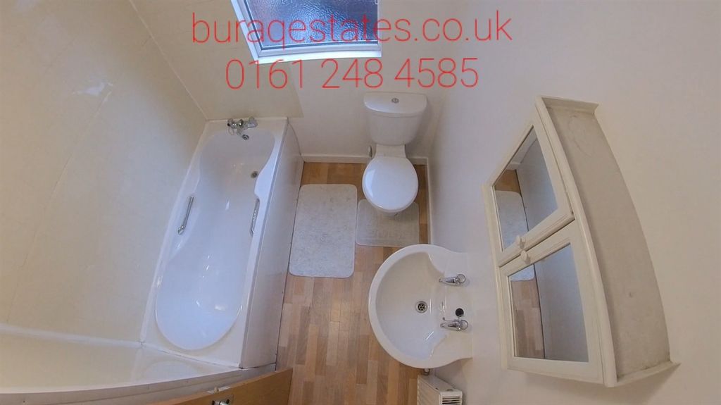 Property photo 3 of 15 Bright And Clean Bathroom Suite Featuring A Full-S...