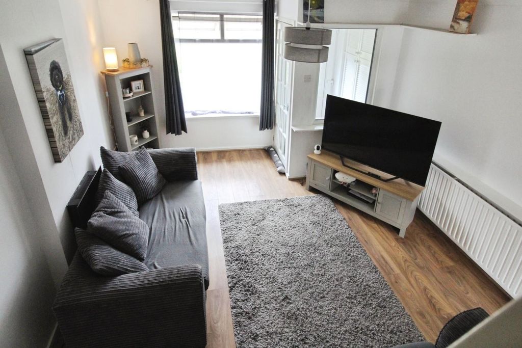Property photo 2 of 12 Living Room: