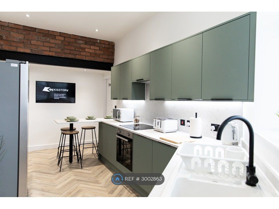 Property photo 2 of 12 Kitchen Area