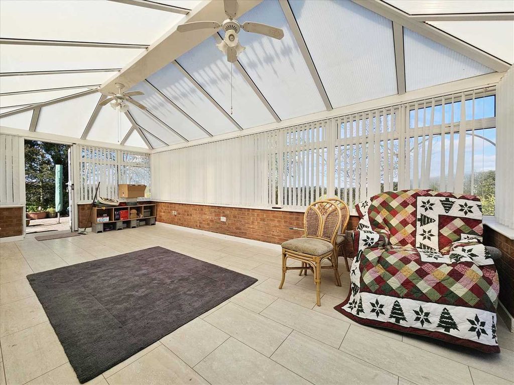 Property photo 3 of 18 Conservatory: