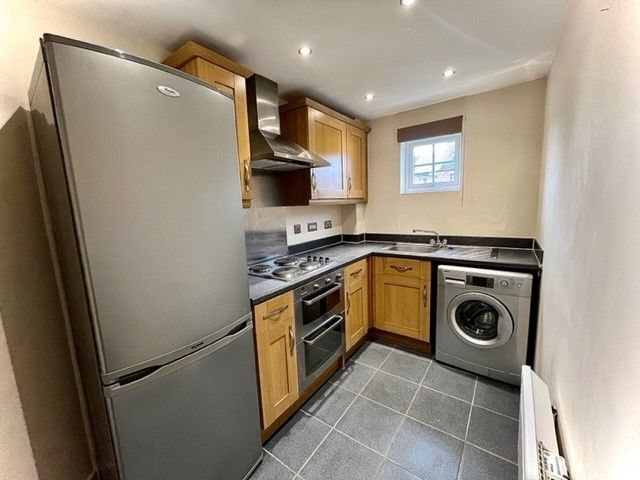 Property photo 3 of 8 Kitchen