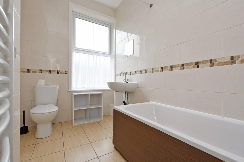 Property photo 2 of 10 Bright And Clean Bathroom Suite Featuring A Large ...