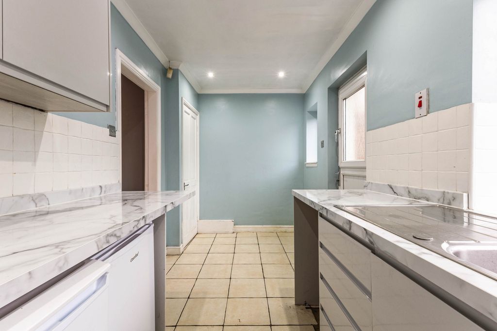 Property photo 3 of 13 Kitchen