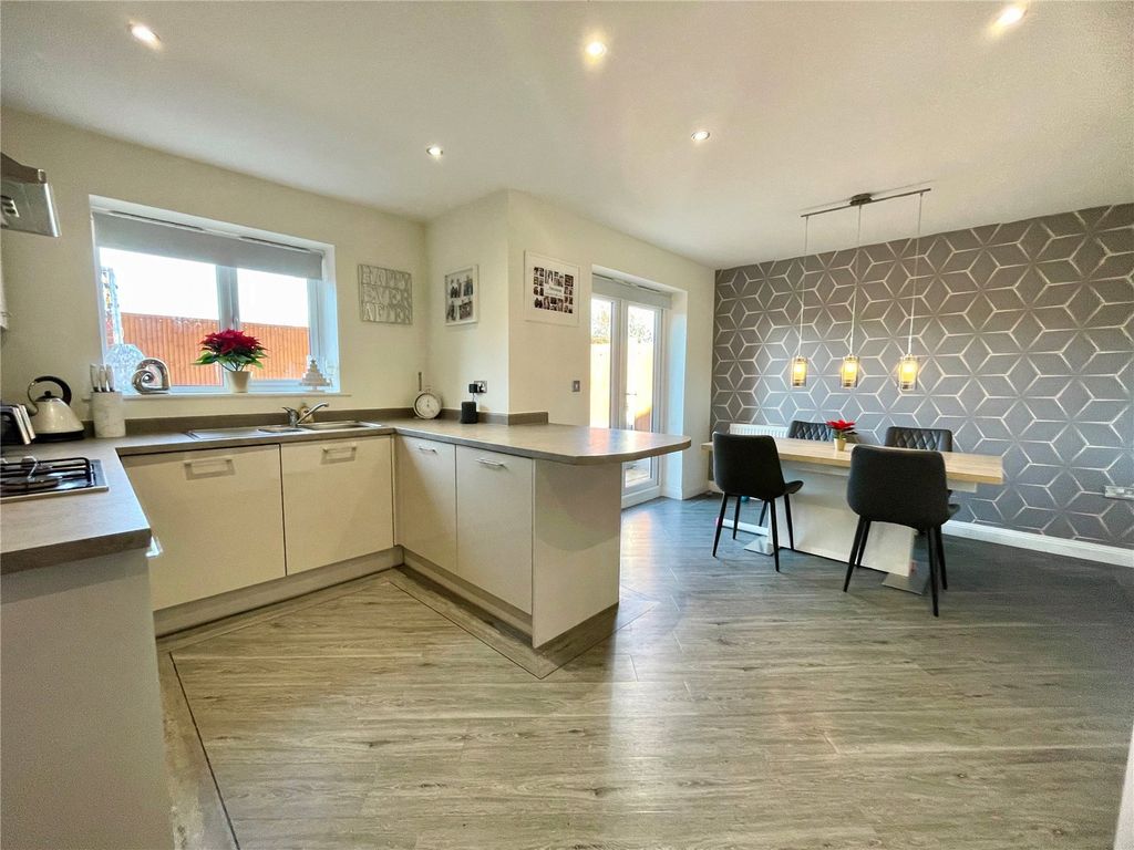 Property photo 3 of 26 Dining Kitchen