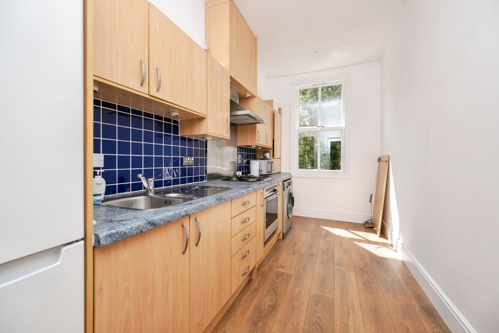 Property photo 3 of 12 Kitchen