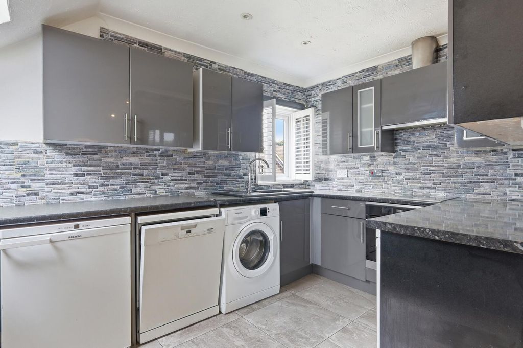 Property photo 3 of 12 Kitchen