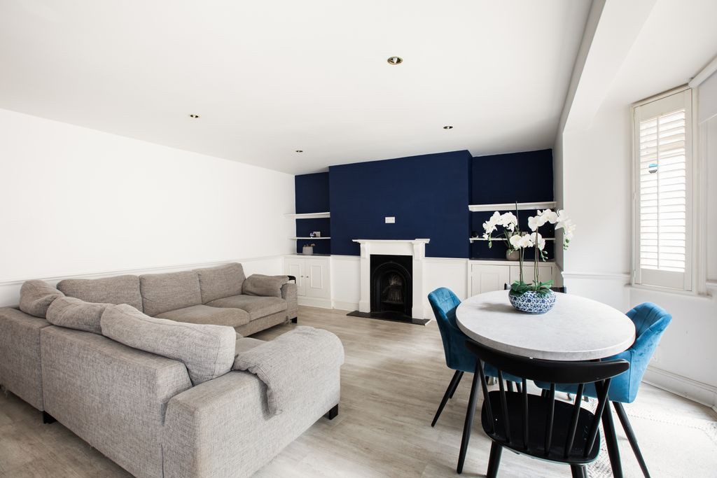 Property photo 1 of 14 Spacious Living Dining Area With Fireplace