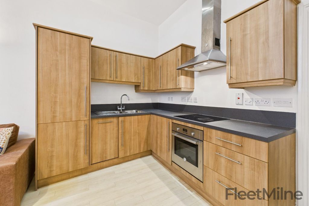 Property photo 3 of 12 Kitchen
