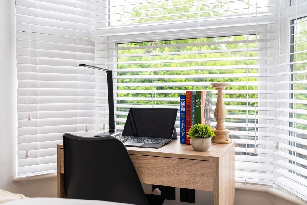 Property photo 3 of 14 A Bright And Tidy Workspace Featuring A Wooden Des...
