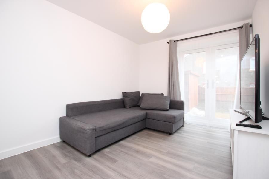 Property photo 1 of 11 Bright, Modern Living Room With A Grey L-Shaped So...