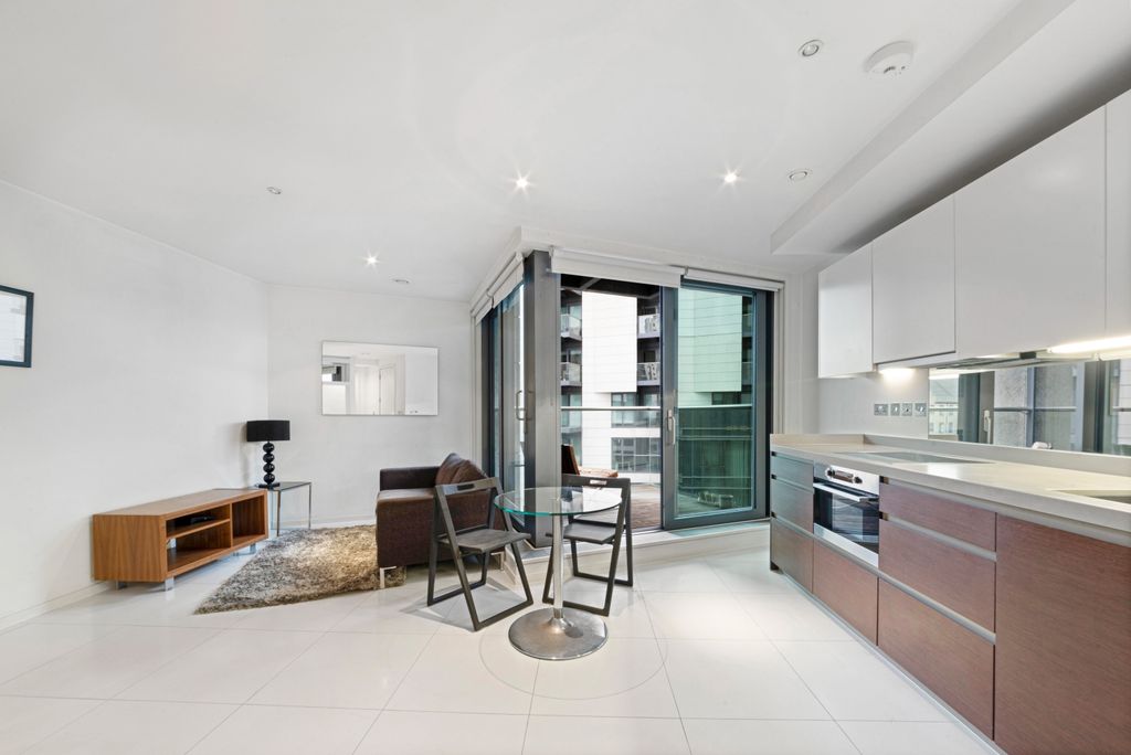 Property photo 1 of 8 Living Area