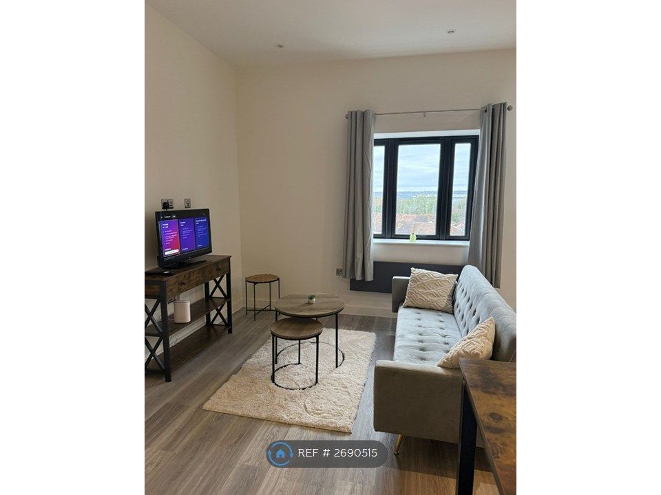 Property photo 1 of 9 Living Area