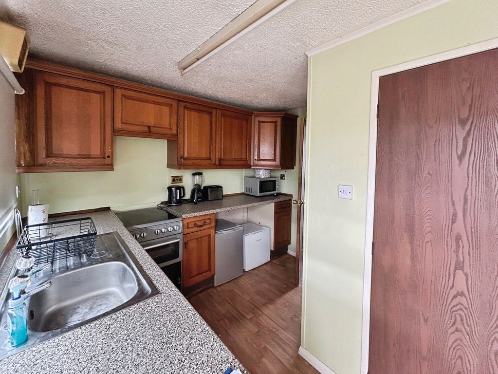 Property photo 2 of 13 Kitchen