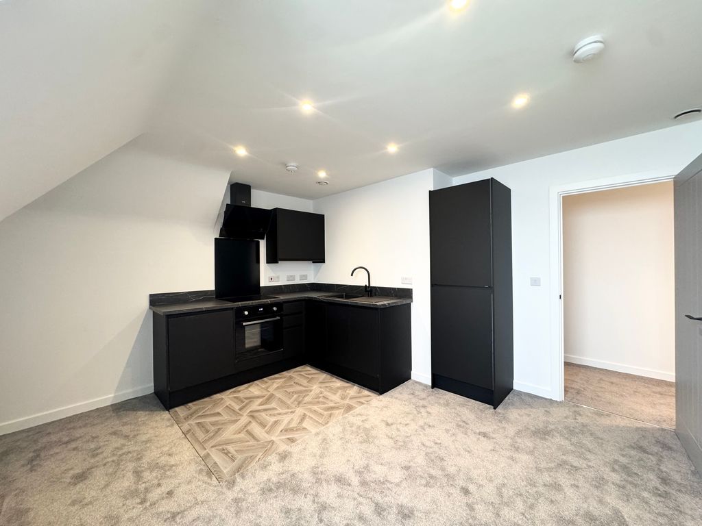 Property photo 3 of 6 Kitchen