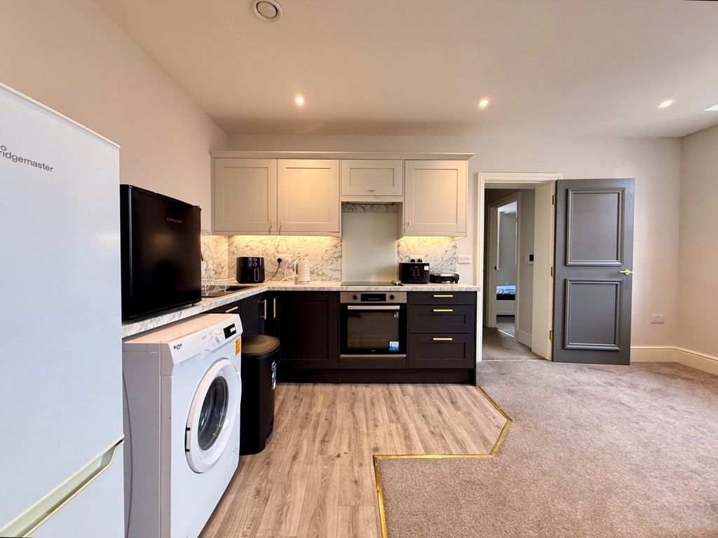 Property photo 3 of 6 Kitchen