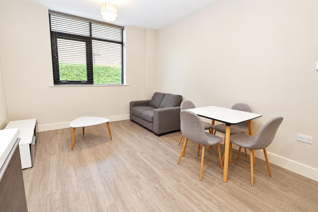 Property photo 1 of 6 Bright Open Living Area With Modern Dining Setup...