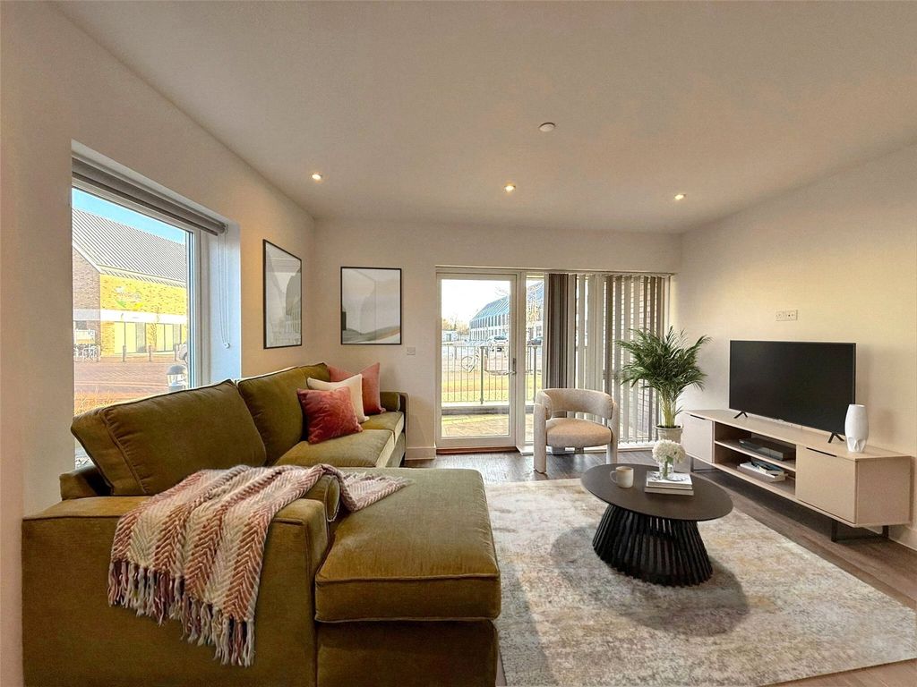 Property photo 1 of 11 Kitchen Living Area