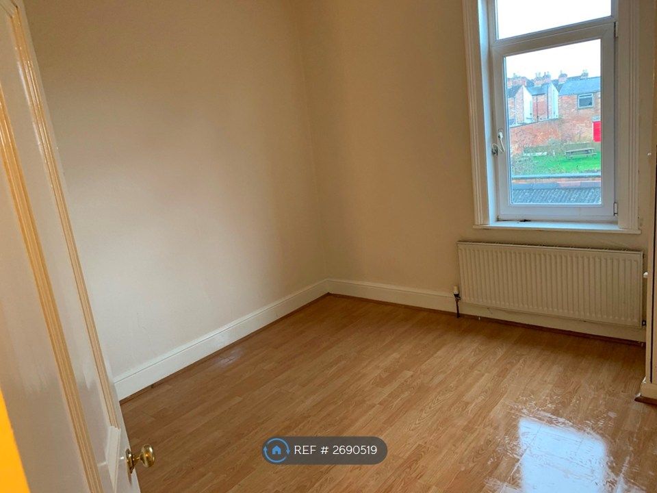 Property photo 3 of 12 Back Bedroom