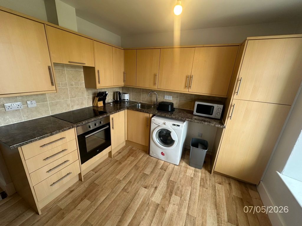 Property photo 2 of 12 Kitchen
