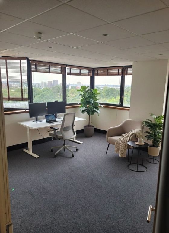 Property photo 3 of 4 Bright Corner Workspace With Large Wrap-Around Win...