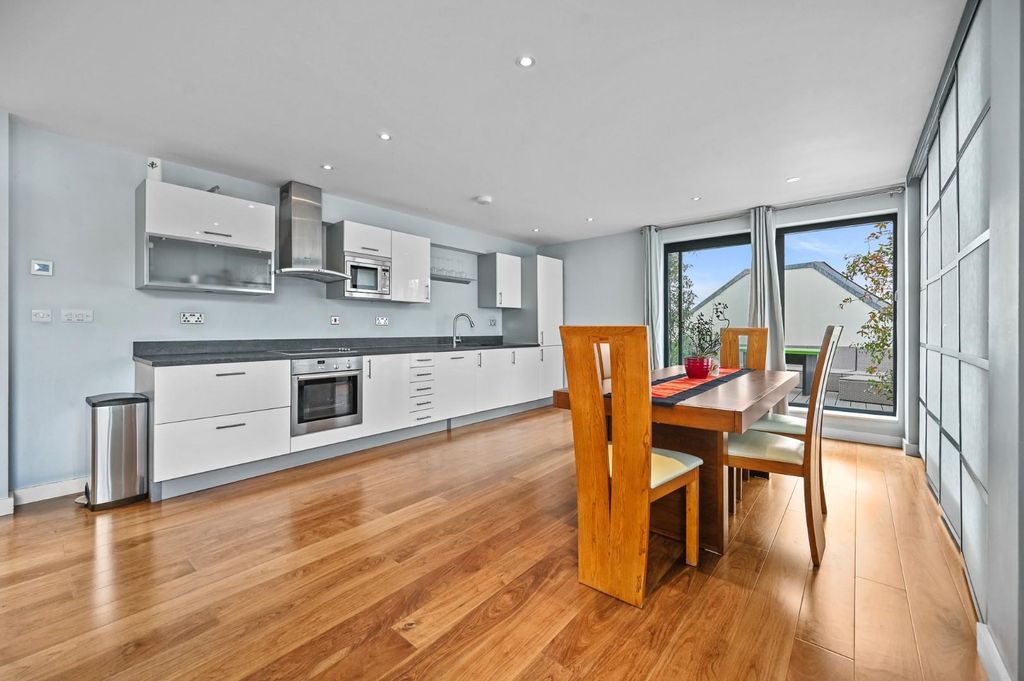 Property photo 2 of 13 Rctec- Flat 14, 141-153 Drummond Street- Dining Ar