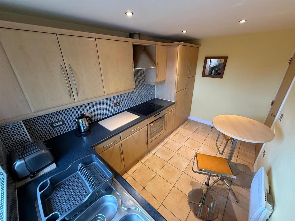 Property photo 3 of 13 Kitchen