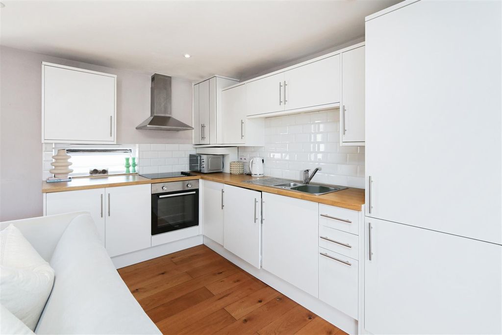 Property photo 3 of 8 Kitchen Area