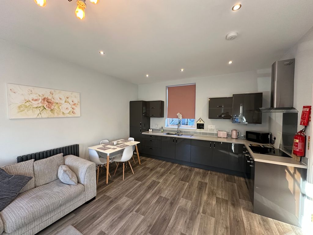 Property photo 3 of 9 Kitchen