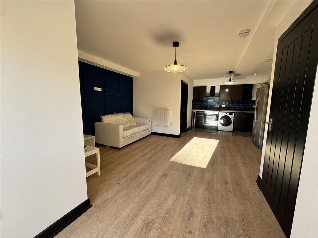 Property photo 3 of 14 Living Area
