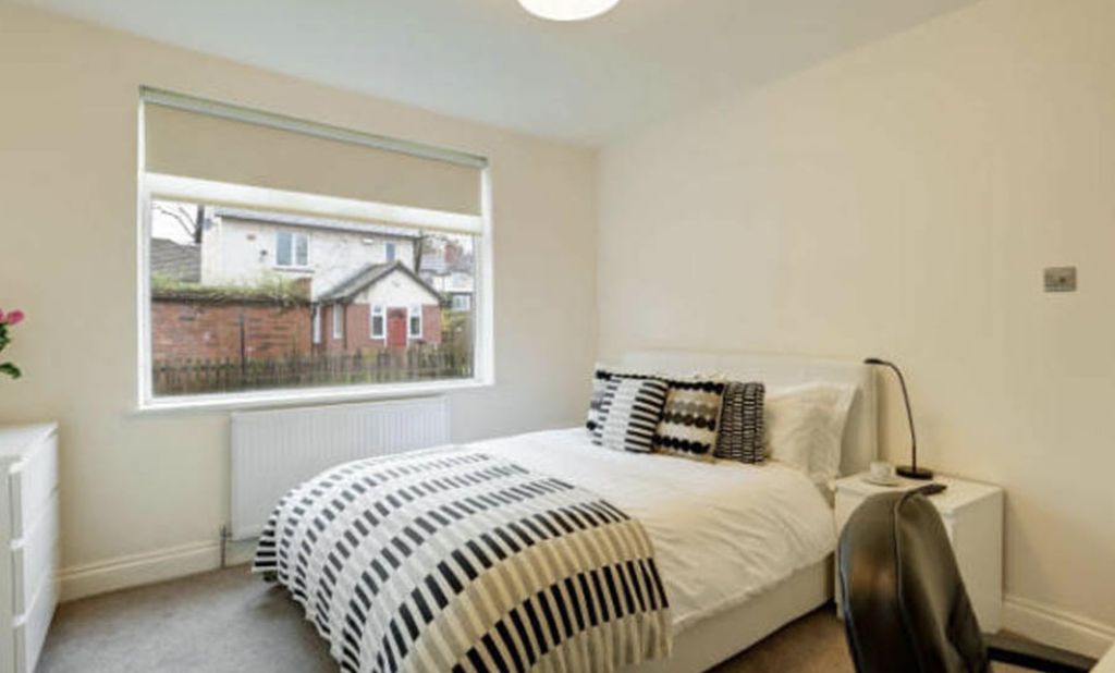 Property photo 3 of 7 A Well-Lit, Tidy Bedroom Featuring A Comfortable d...