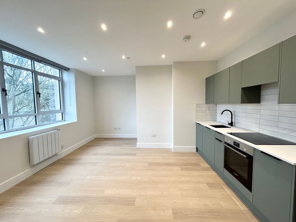 Property photo 1 of 9 Living Area