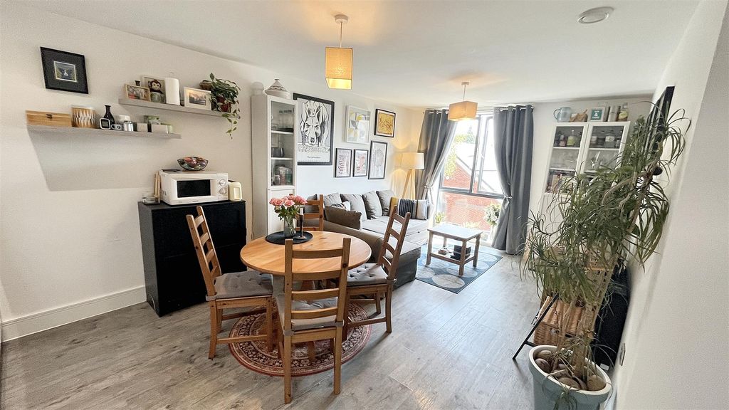 Property photo 3 of 12 Kitchen/Dining And Living Room