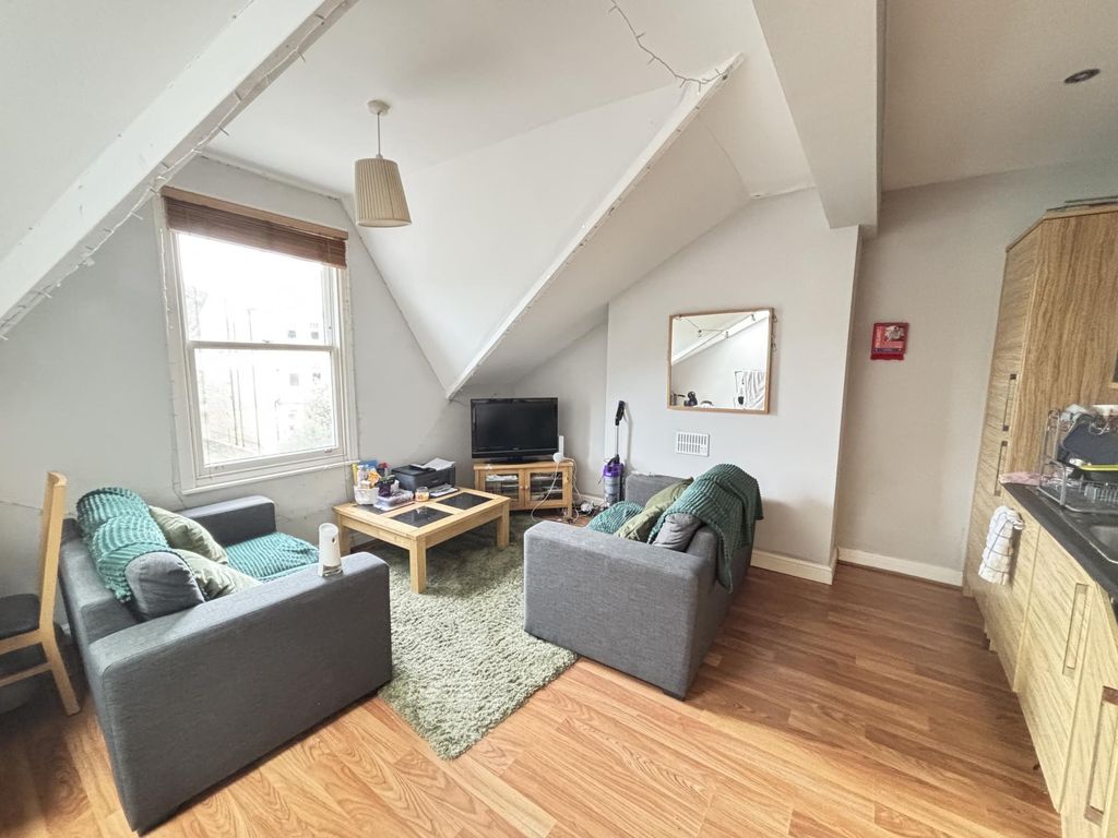 Property photo 2 of 7 Bright And Welcoming Living Room With Modern Furni...