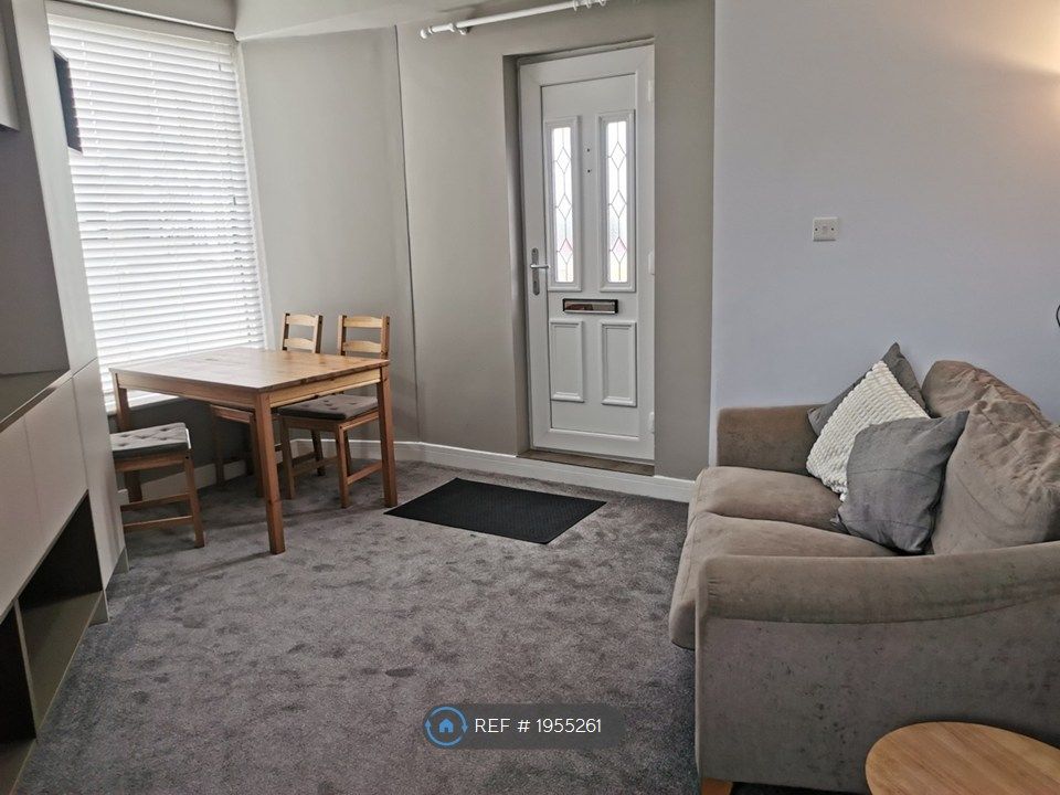 Property photo 2 of 10 Carpeted Living Area