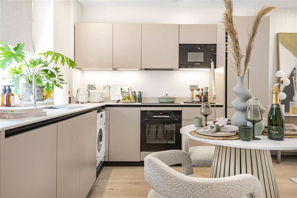 Property photo 3 of 9 Kitchen Living