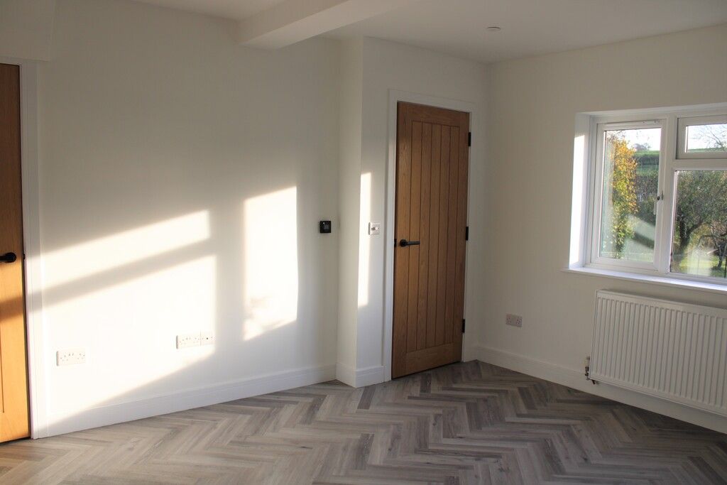 Property photo 2 of 15 Living Area