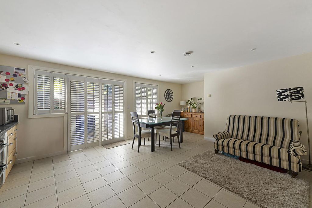 Property photo 3 of 17 Kitchen/Dining/Family Room