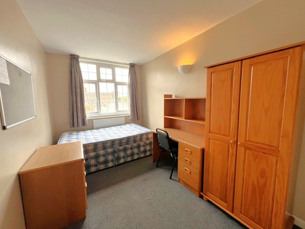 Property photo 1 of 11 A Cozy Student Bedroom Featuring A Single Bed, A W...