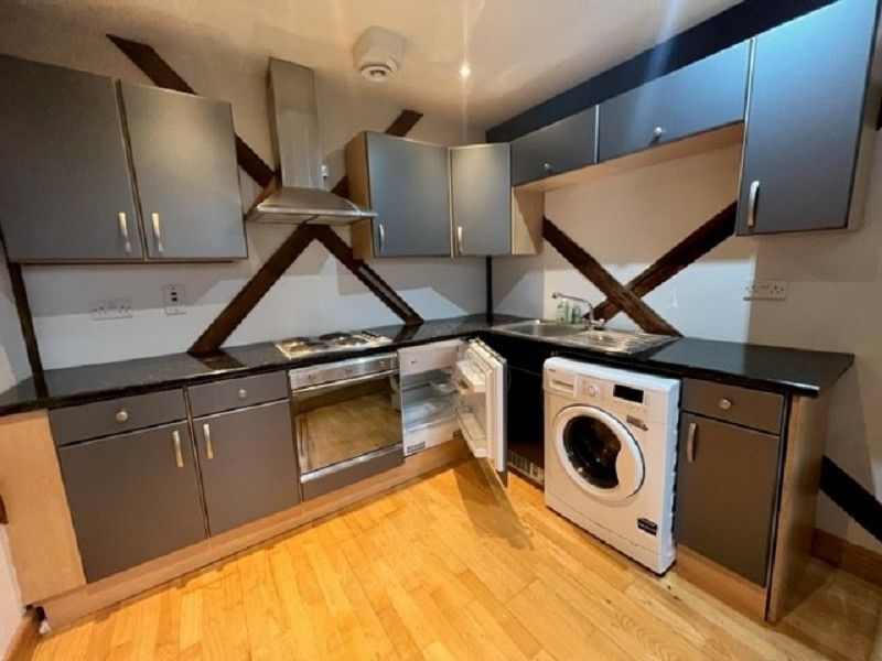 Property photo 2 of 8 Kitchen