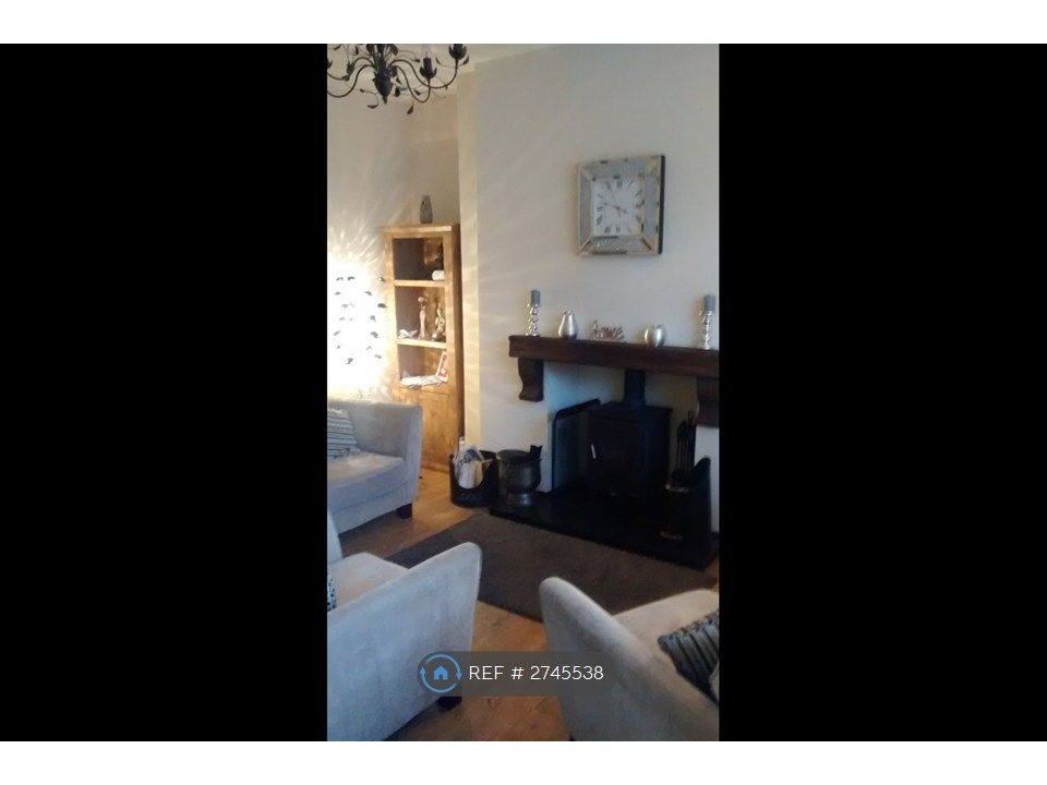 Property photo 3 of 7 Lounge With Log Burner
