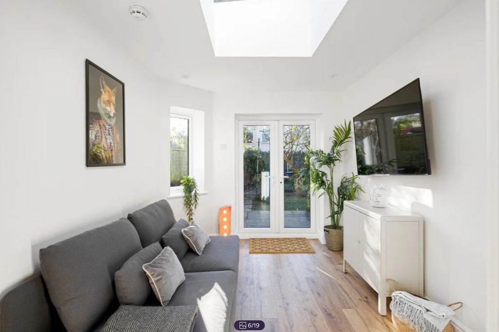Property photo 2 of 19 A Spacious And Bright Modern Living Room With Ampl...