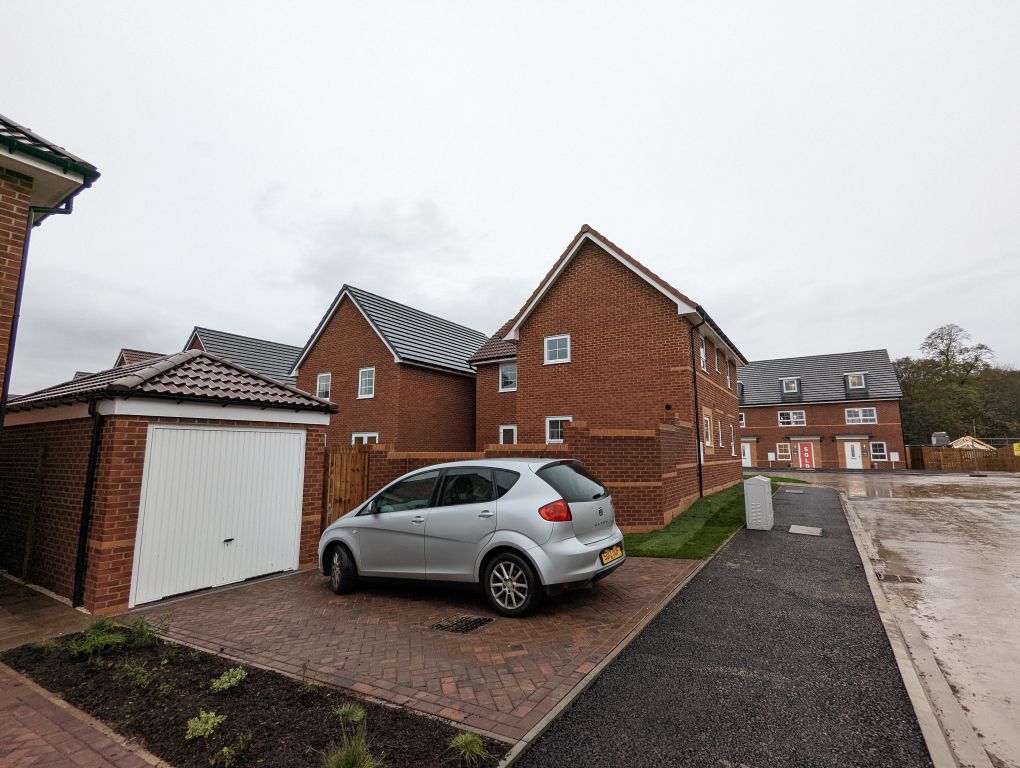 Property photo 2 of 14 Garage