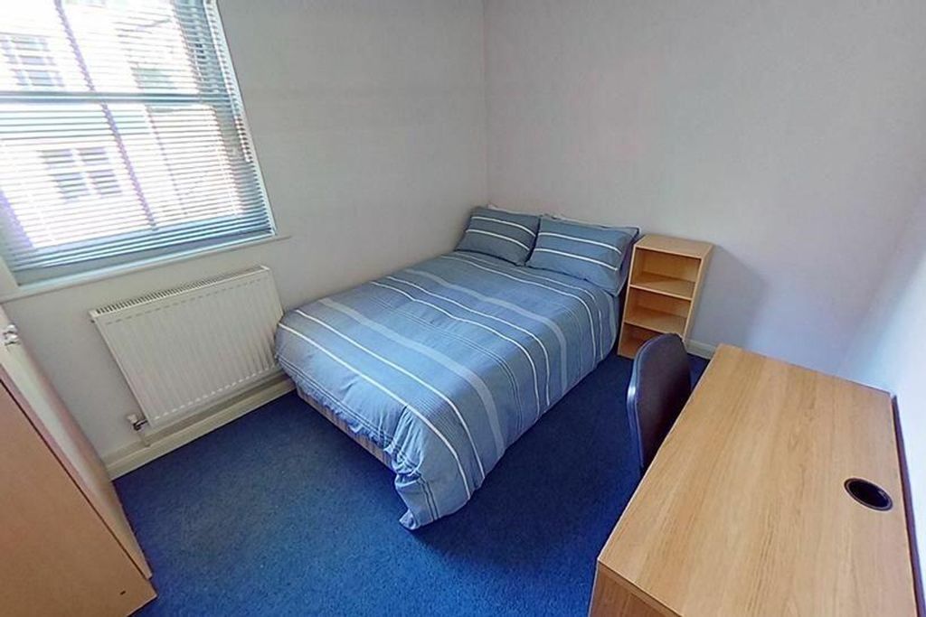 Property photo 2 of 3 This Cozy Double Bedroom Features A Comfortable Be...