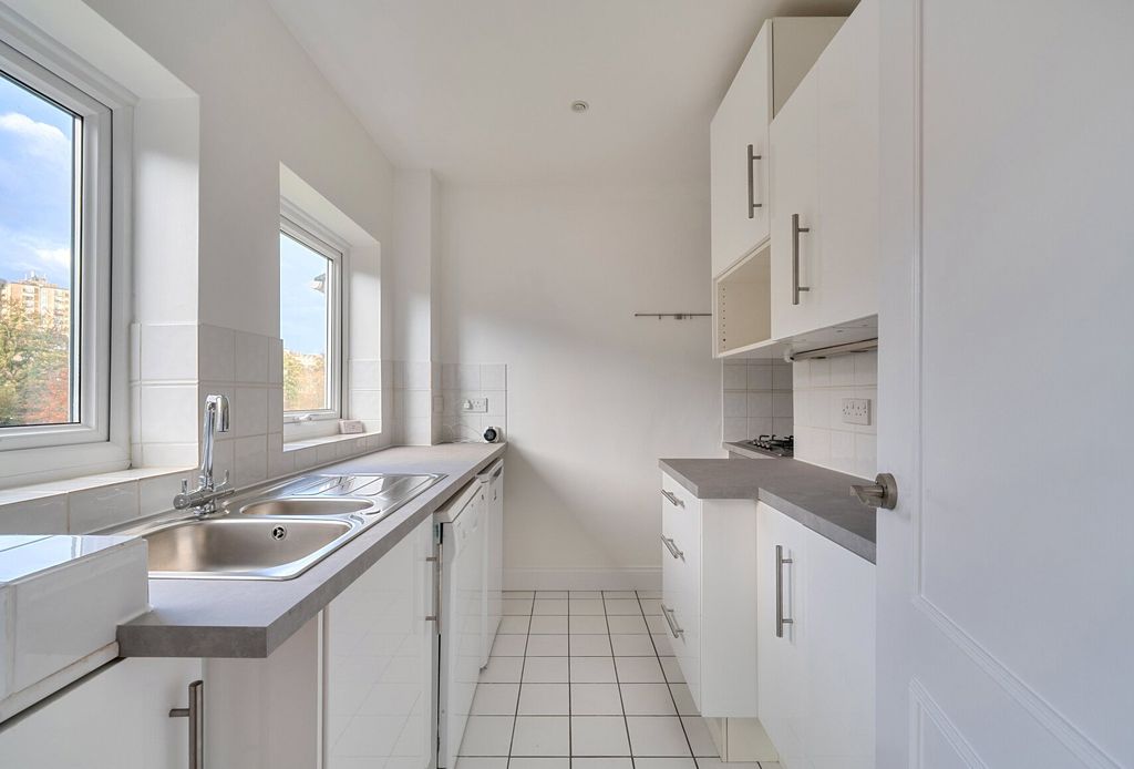 Property photo 3 of 12 Kitchen