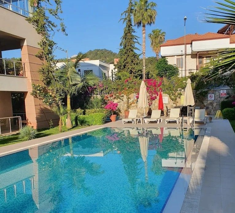 Property photo 1 of 21 Apartment In Antalya For Sale Near The Beach In Kemer - Complex With A Shared Pool