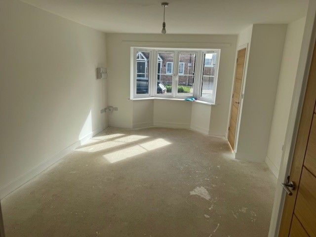 Property photo 3 of 8 Living Room