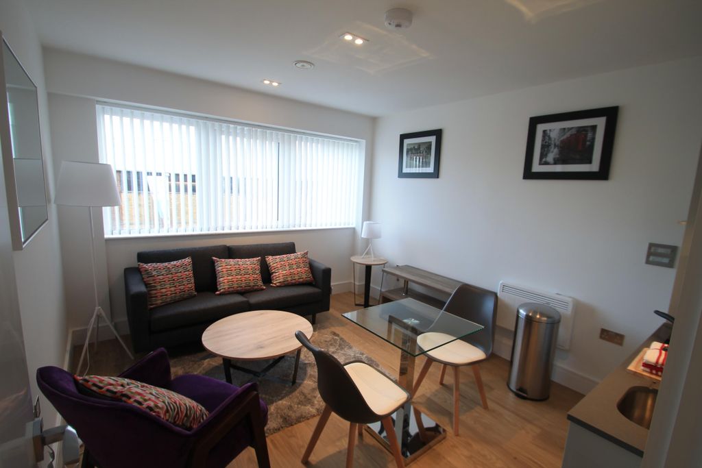 Property photo 2 of 12 Living Room