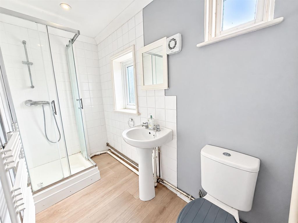 Property photo 3 of 10 Bright Minimalist Bathroom Interior (1).Png
