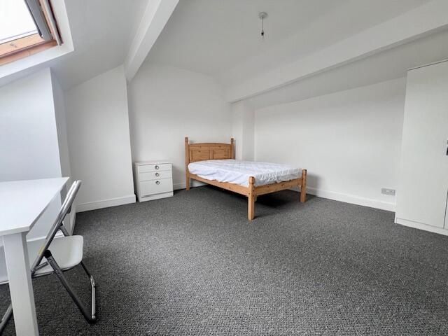 Property photo 1 of 11 A Spacious And Bright Master Bedroom Featuring A W...